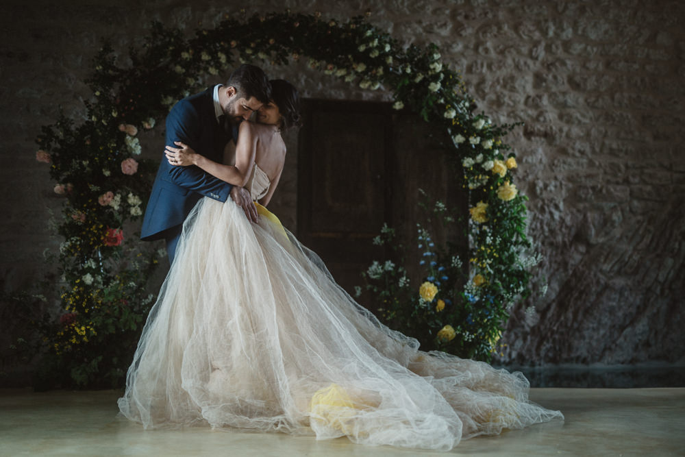 Le Marche Wedding Inspiration Francesca Angrisano Moon Gate Flower Arch Backdrop Yellow Greenery Foliage