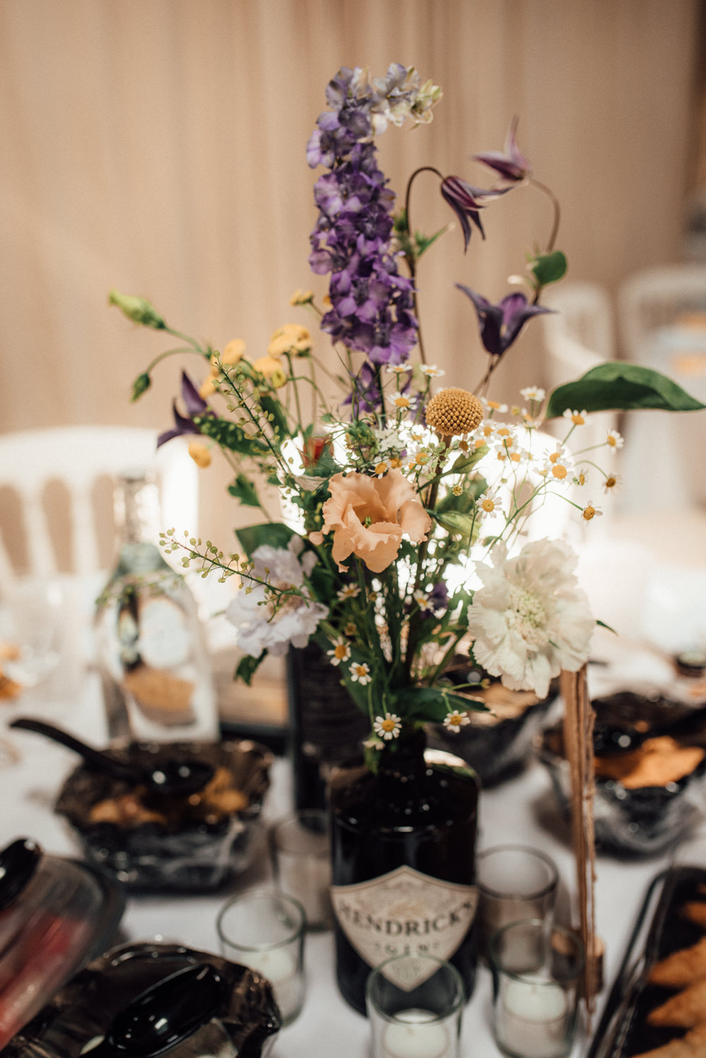 Table Flowers Centrepiece Gin Bottle Lineham Farm Wedding Marni V Photography