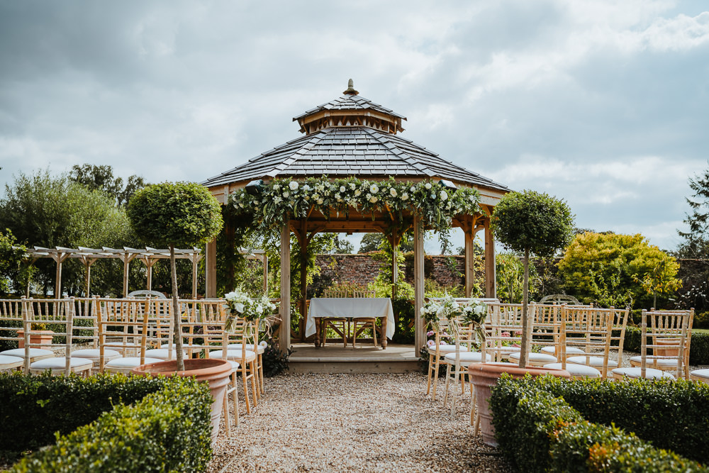 Secret Garden Kent Outdoor Ceremony Gazeebo Pagoda Flowers Greenery Foliage Micro Wedding Nicola Dawson Photography