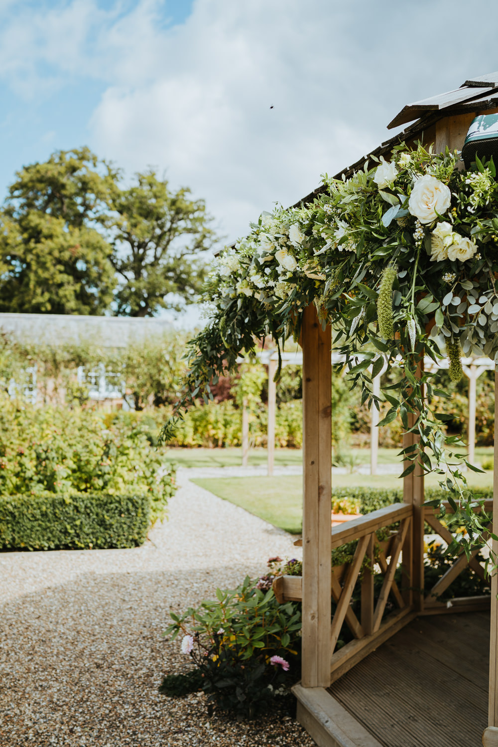 Secret Garden Kent Outdoor Ceremony Gazeebo Pagoda Flowers Greenery Foliage Micro Wedding Nicola Dawson Photography