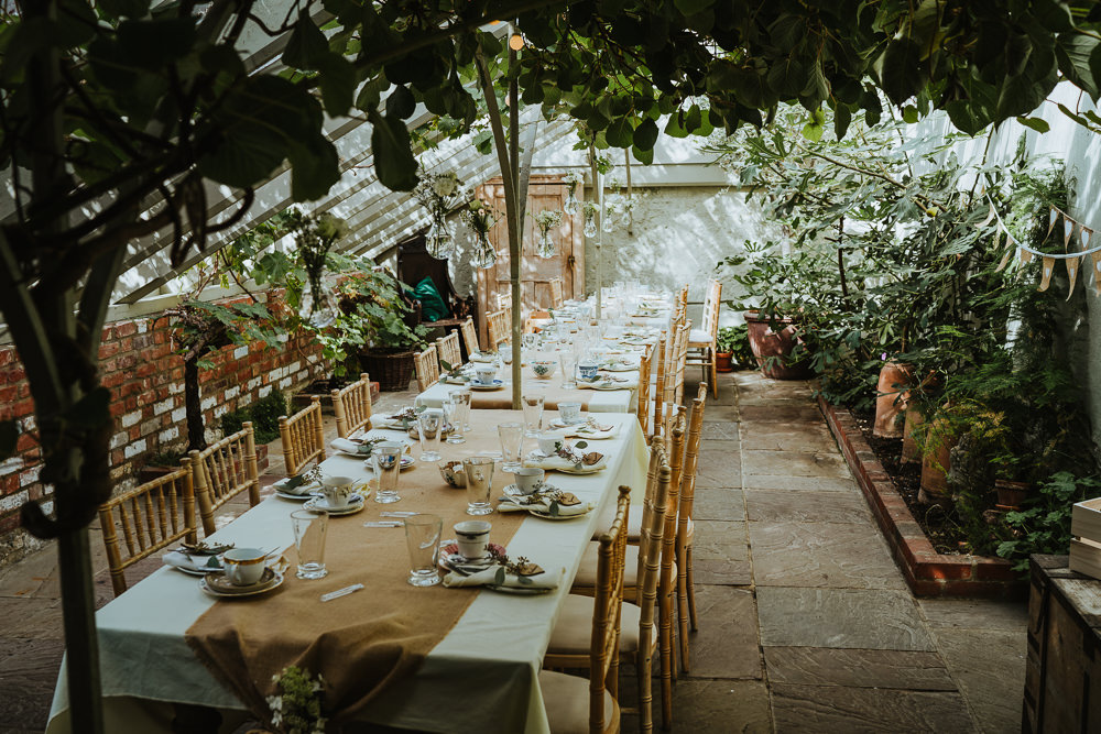 Glass House Reception Secret Garden Kent Trees Hessian Burlap Tables Festoon Lights Hanging Flowers Micro Wedding Nicola Dawson Photography