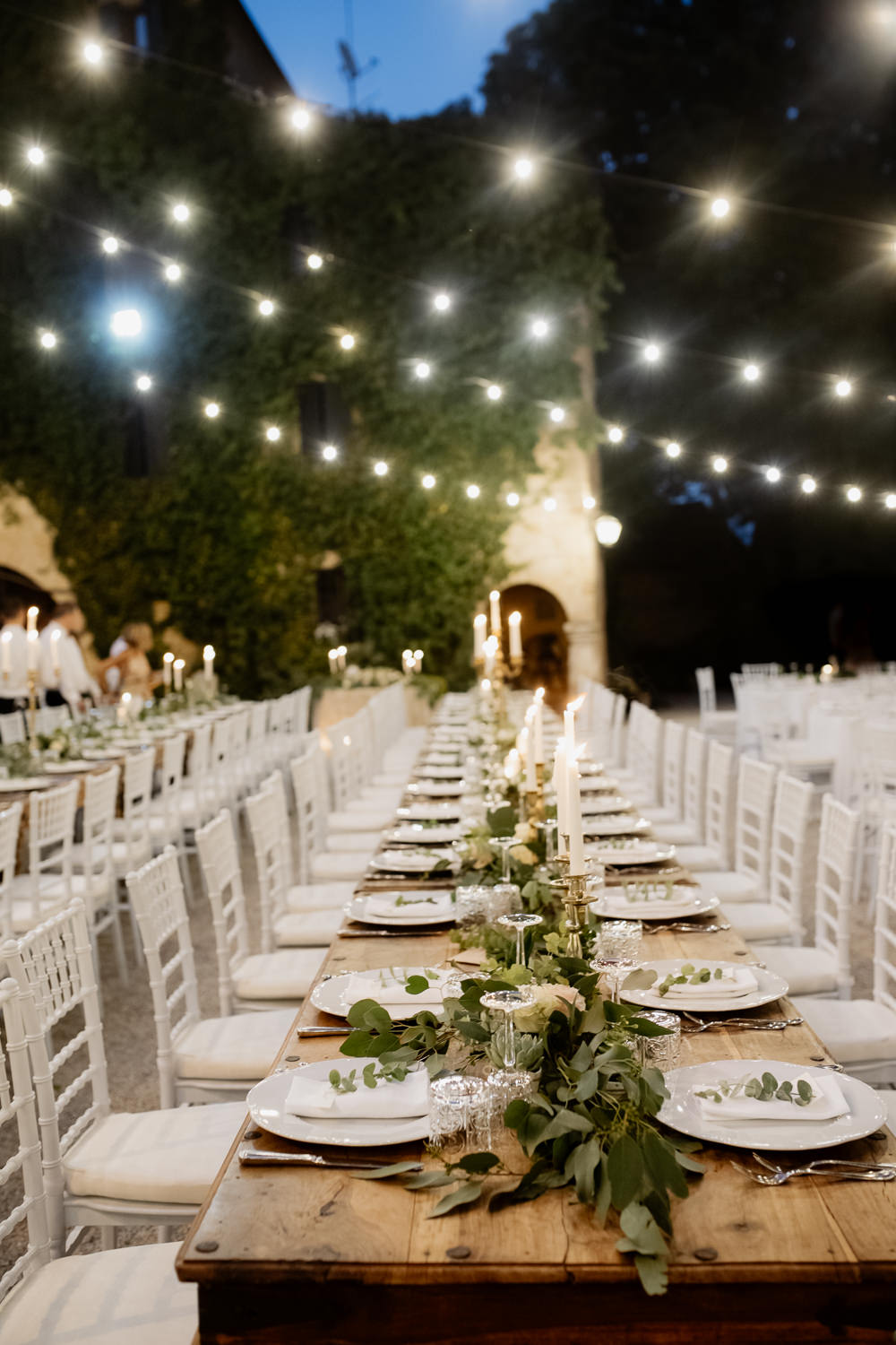 Table Tablescape Greenery Foliage Gold Cutlery Candles Place Setting Festoon Lights Natural Italy Villa Wedding Flavia Eleonora Tullio