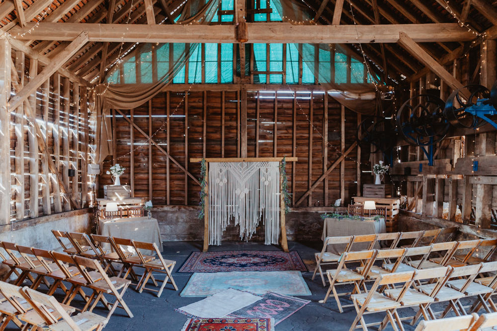 Ceremony Persian Rug Aisle Macrame Backdrop Barns Lodge Farm Wedding Stevie Jay Photography