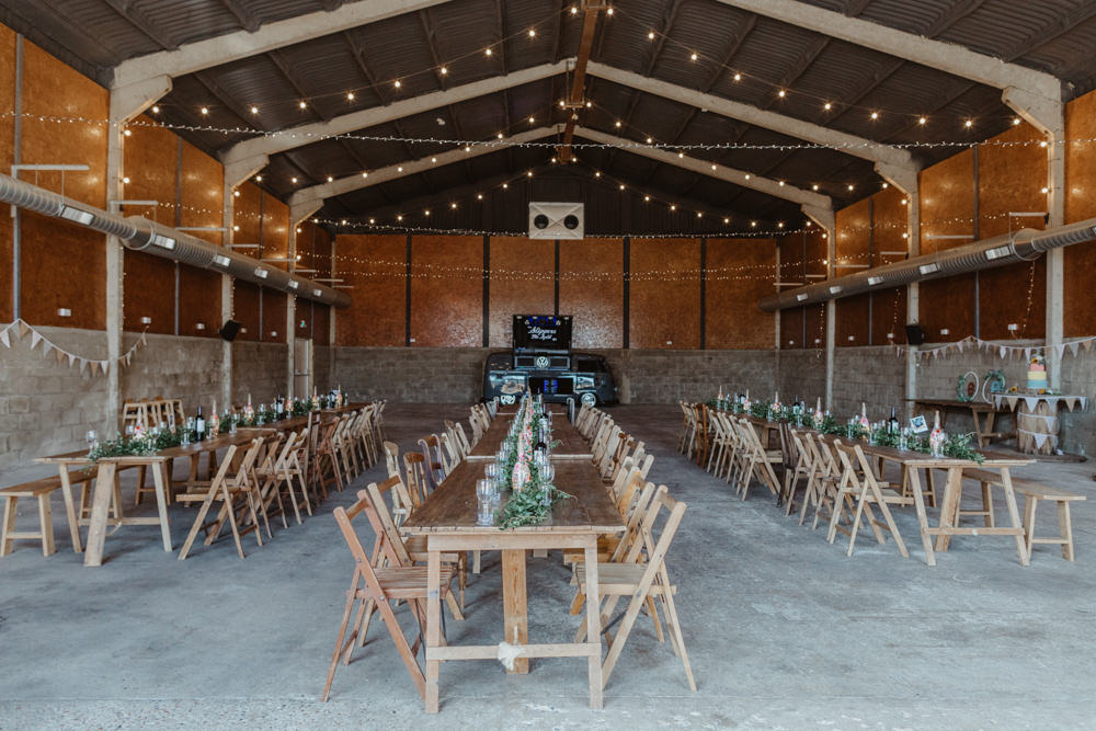 Long Wooden Trestle Tables Chairs Festoon Lights Lighting Barns Lodge Farm Wedding Stevie Jay Photography