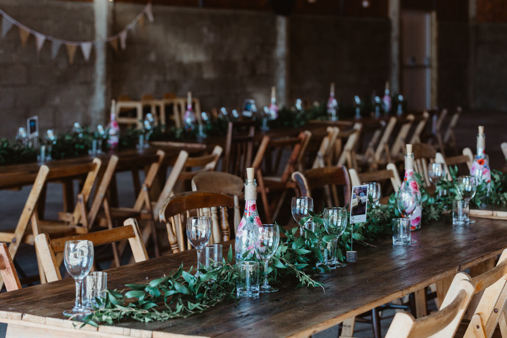 Long Wooden Trestle Tables Chairs Festoon Lights Lighting Greenery Barns Lodge Farm Wedding Stevie Jay Photography