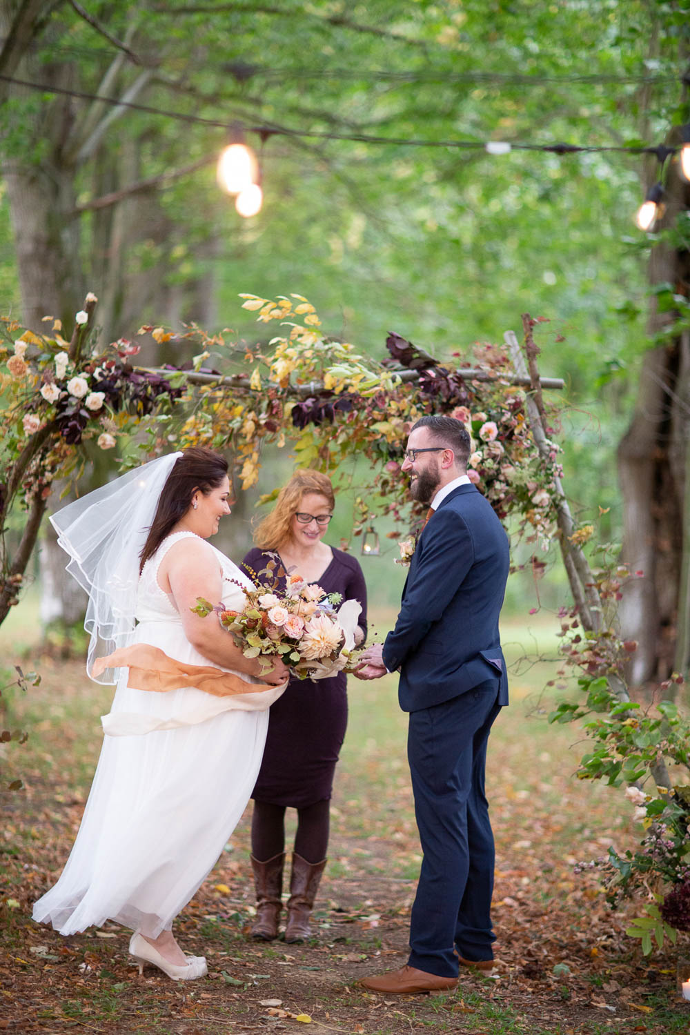 Flower Arch Backdrop Ceremony Woodland Trees Festoon Lights Château Elopement France Maru Photography