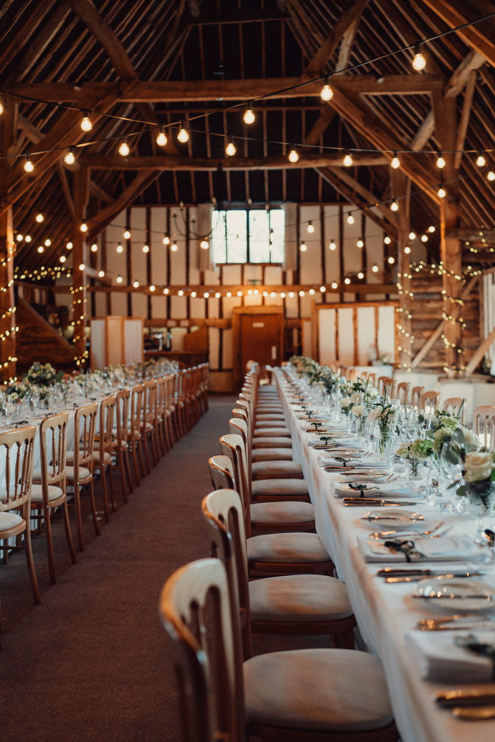 Long Tables Decor Flowers Festoon Lights Lighting Countryside Barn Wedding Emily & Steve Photography