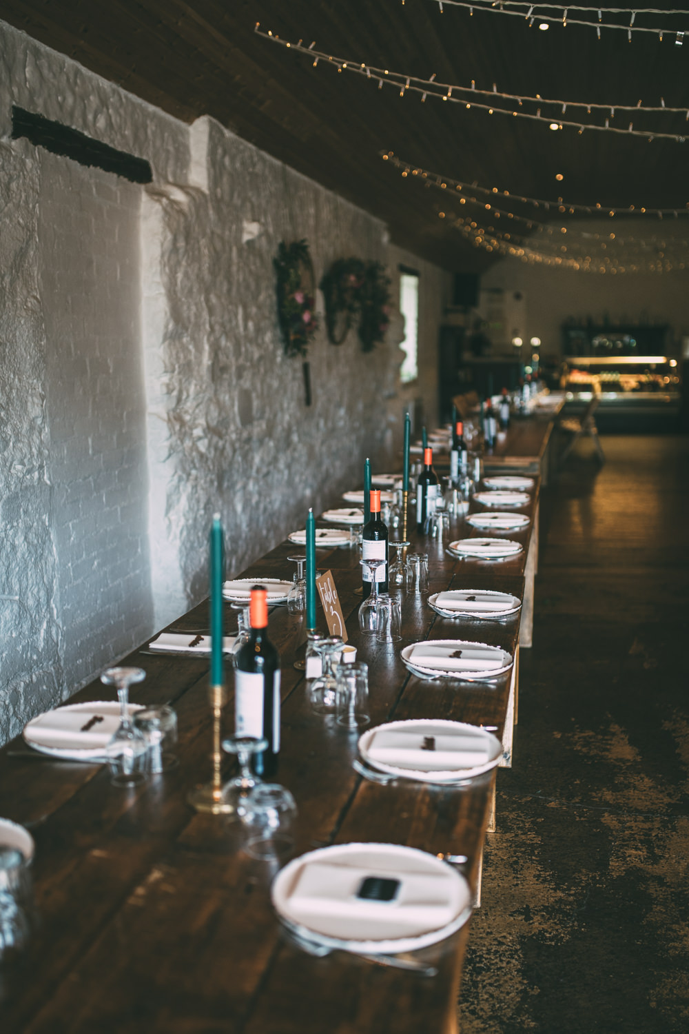 Long Wooden Tables Barn Cand;es Dalduff Farm Wedding Northern Aye Photography