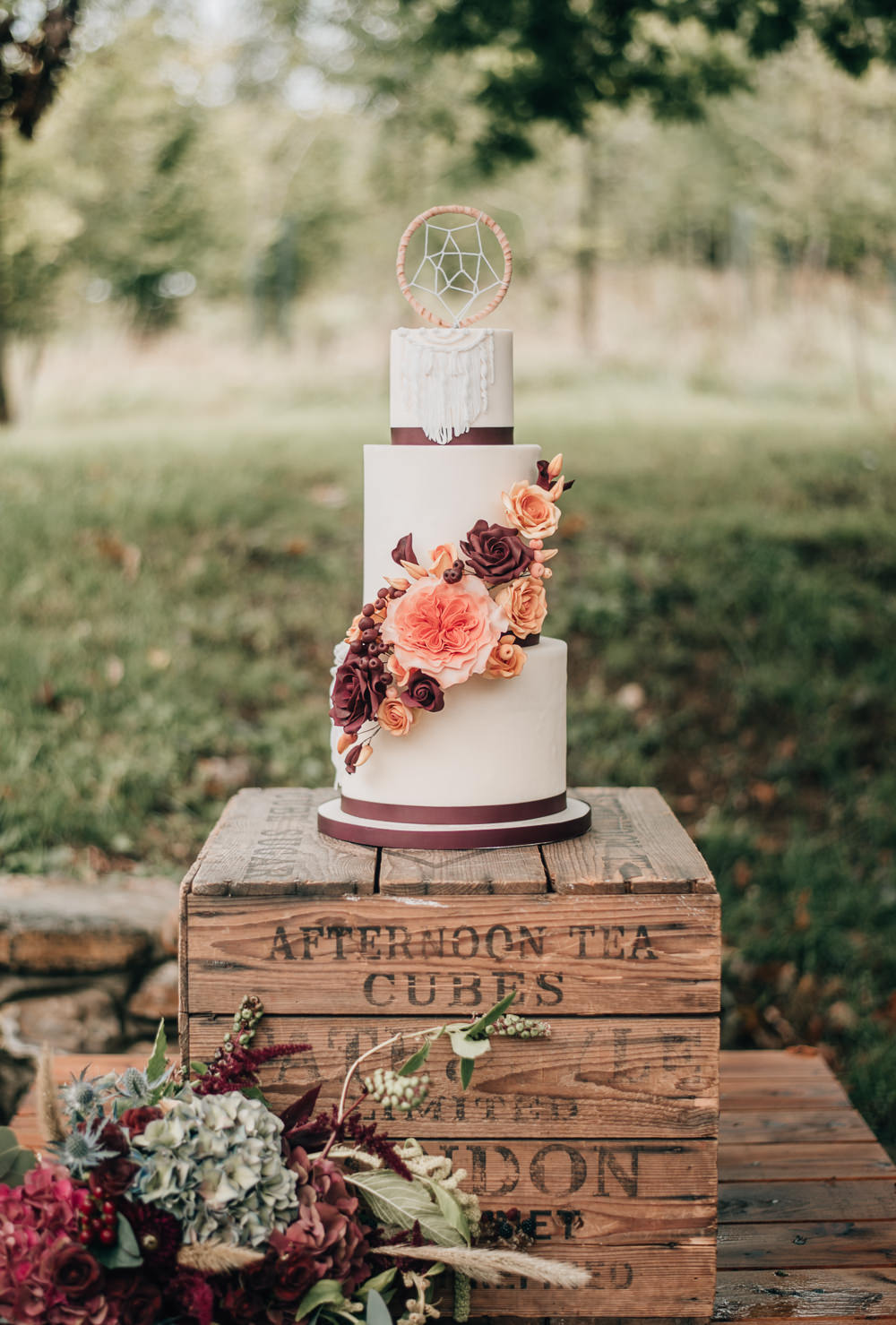 Iced Cake Sugar Flowers Dream Catcher Macrame Burgundy Orange Wooden Crates Stand Eco Friendly Wedding Inspiration Sarah Jayne Photography