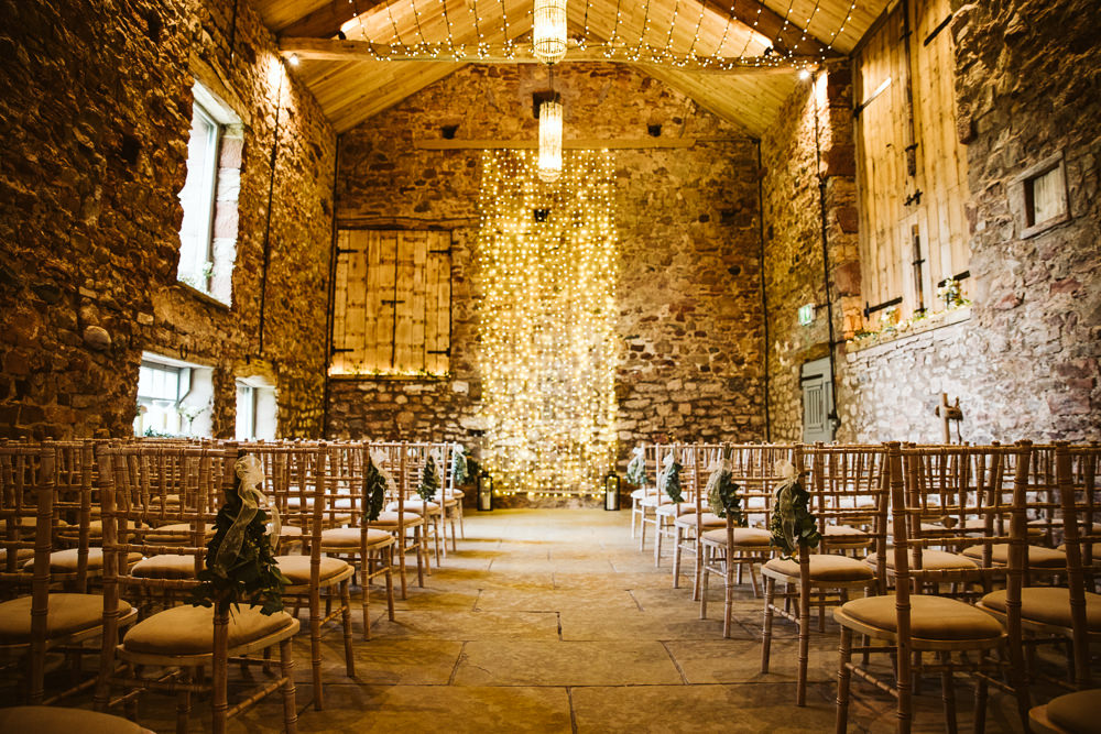 Aisle Ceremony Chairs Lanterns Pew End Flowers Fairy Light Backdrop Eden Barn Wedding Margarita Hope Photography