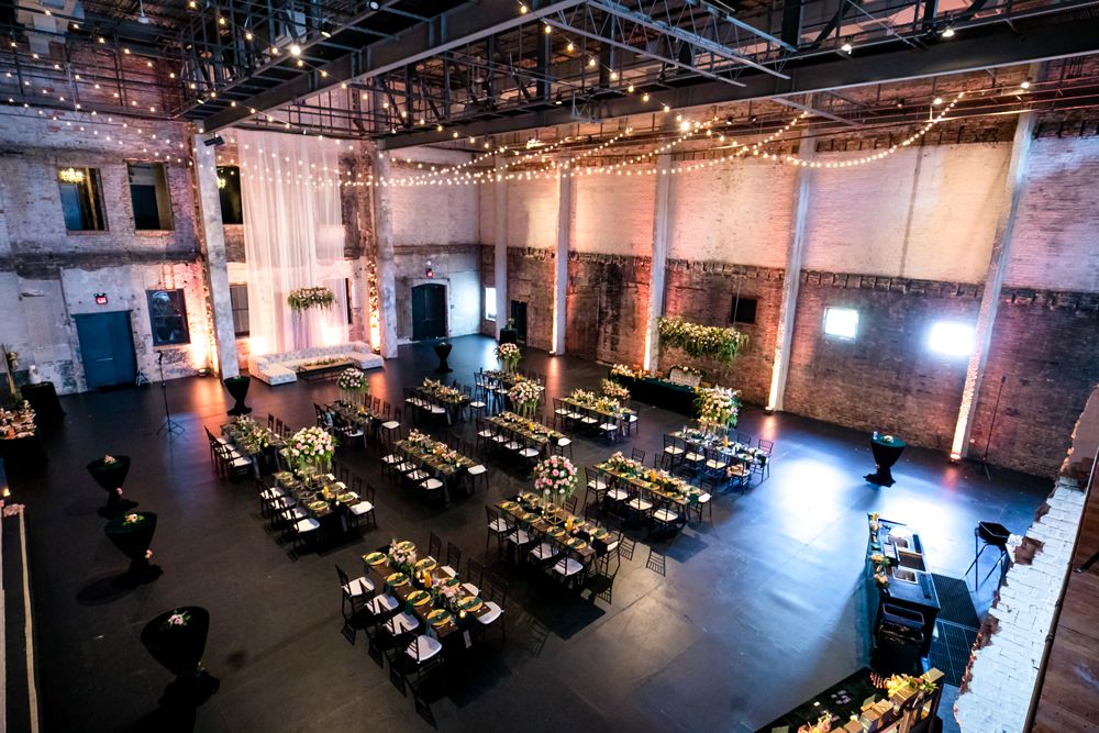 Warehouse Fairy Lights Long Tables Decor Floral Minneapolis Wedding Jeannine Marie Photography