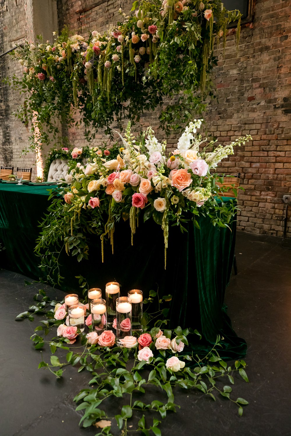 Top Table Centrepiece Suspended Hanging Meadow Flowers Pink Oversized Large Peony Peonies Rose Foliage Greenery Floral Minneapolis Wedding Jeannine Marie Photography