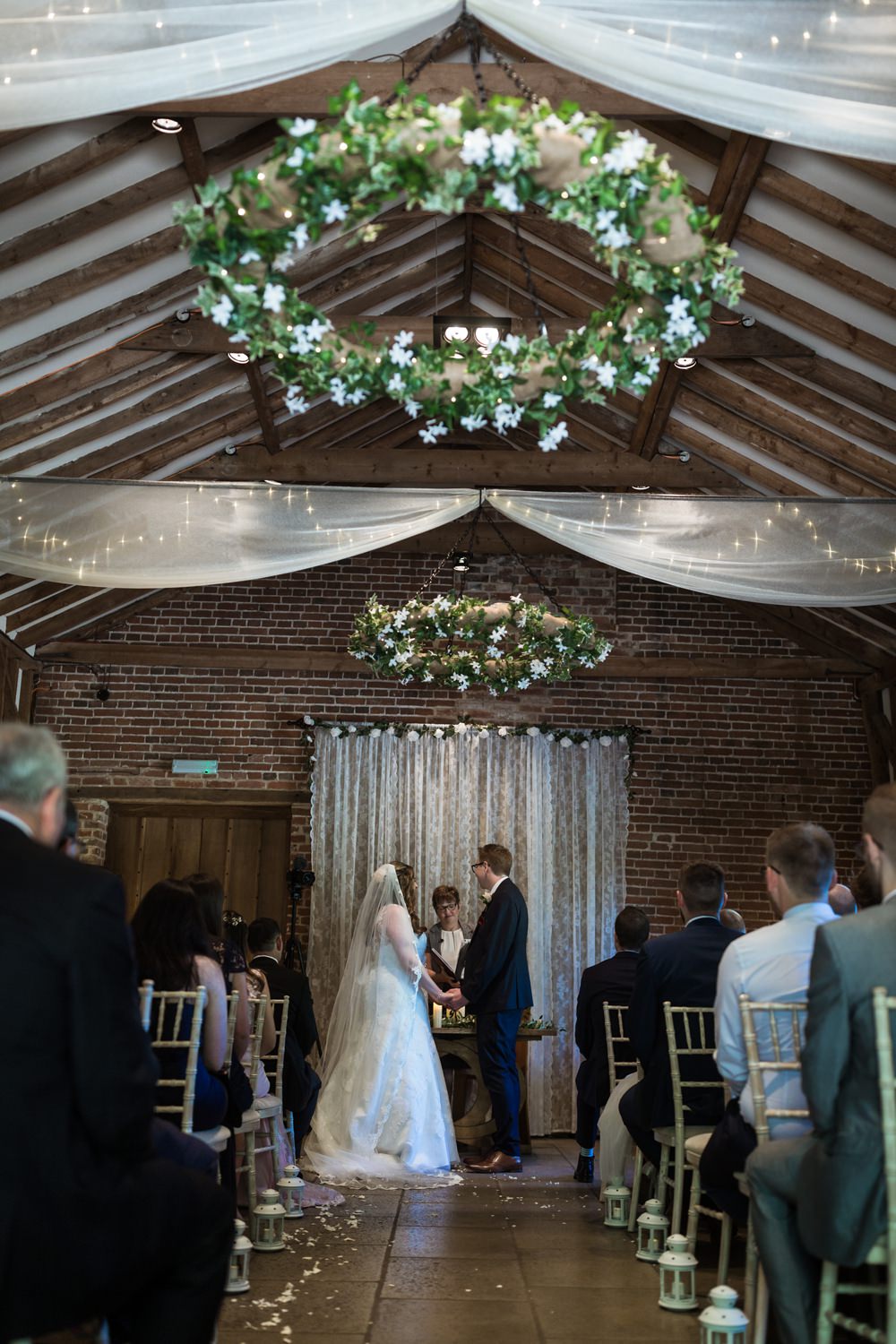 Ceremony Drapes Greenery Hoops Haughley Park Barn Wedding Him and Her Wedding Photography