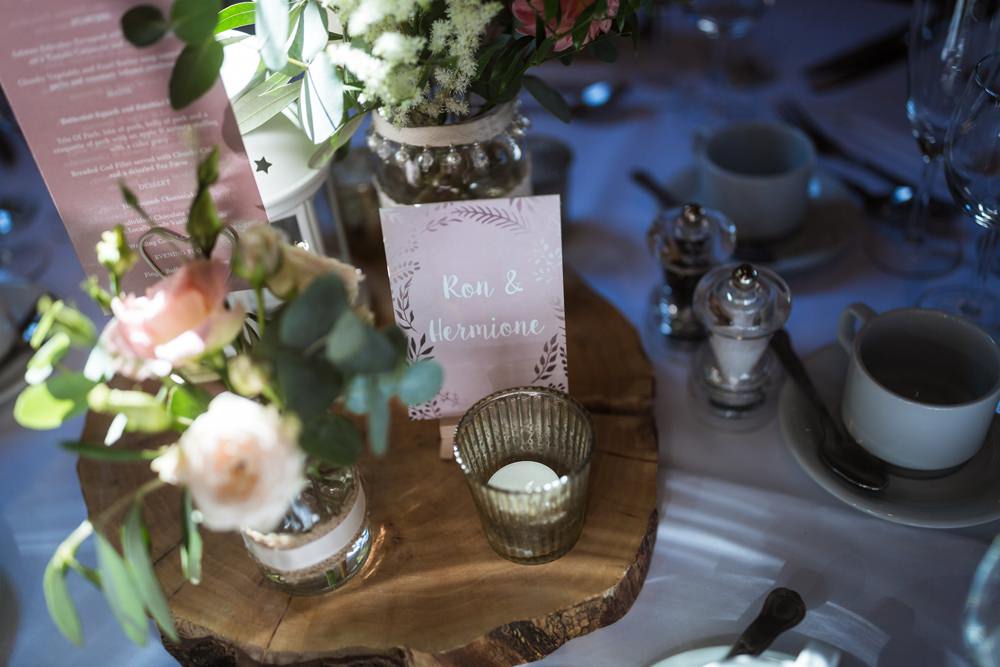 Centrepiece Flowers Table Names Log Slice Harry Potter Haughley Park Barn Wedding Him and Her Wedding Photography