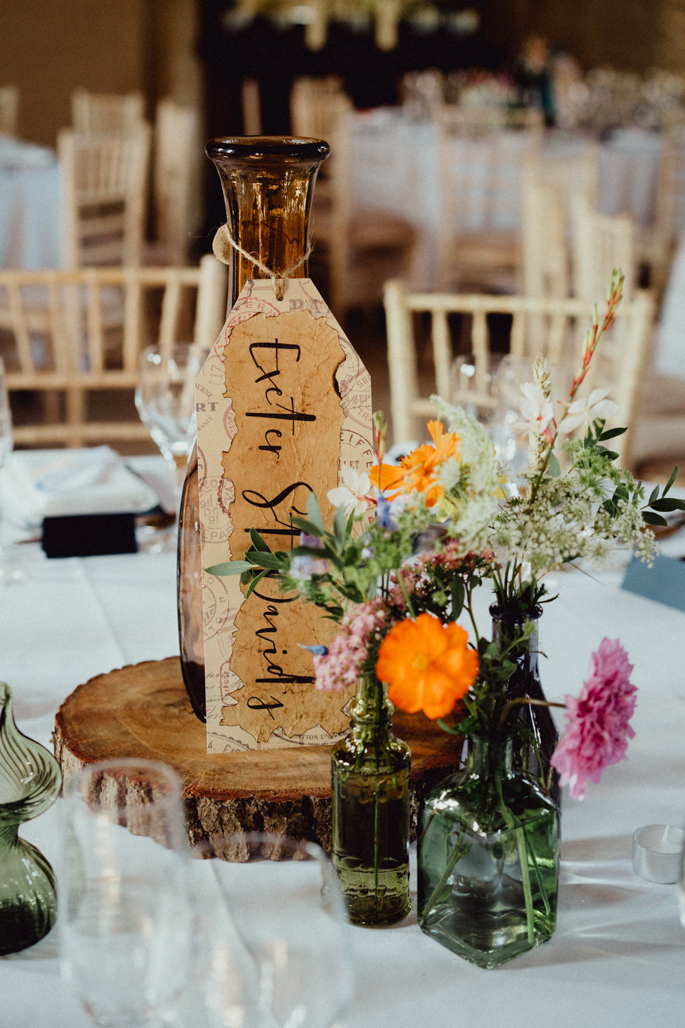 Centrepiece Table Flowers Bottle Table Name Log Slice Priors Court Barn Wedding Emily & Steve Photography