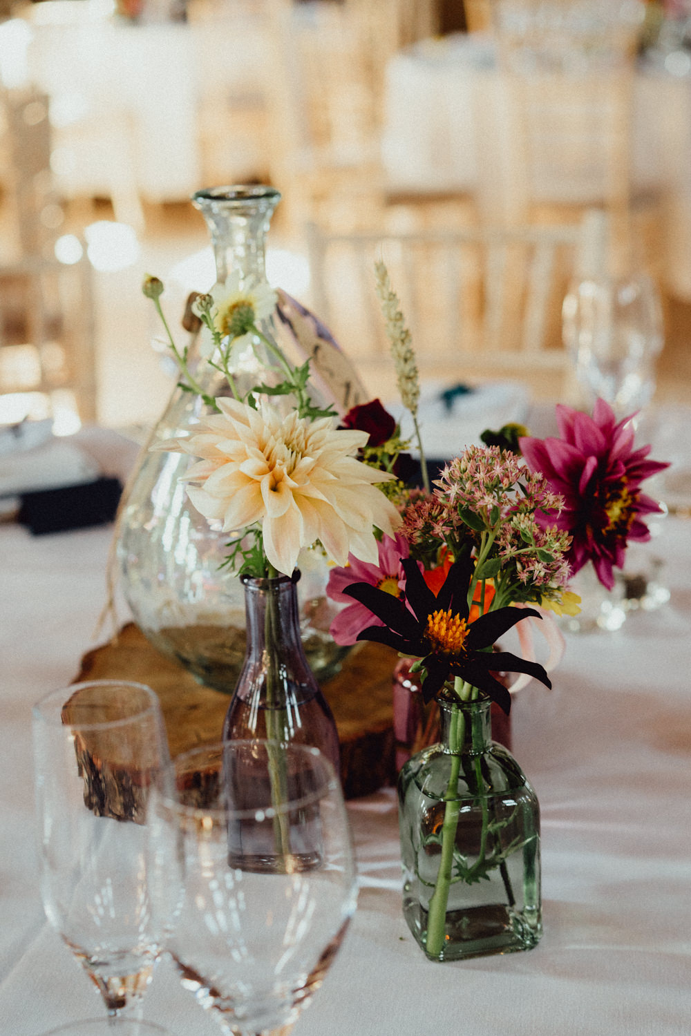 Centrepiece Table Flowers Bottle Table Name Log Slice Priors Court Barn Wedding Emily & Steve Photography