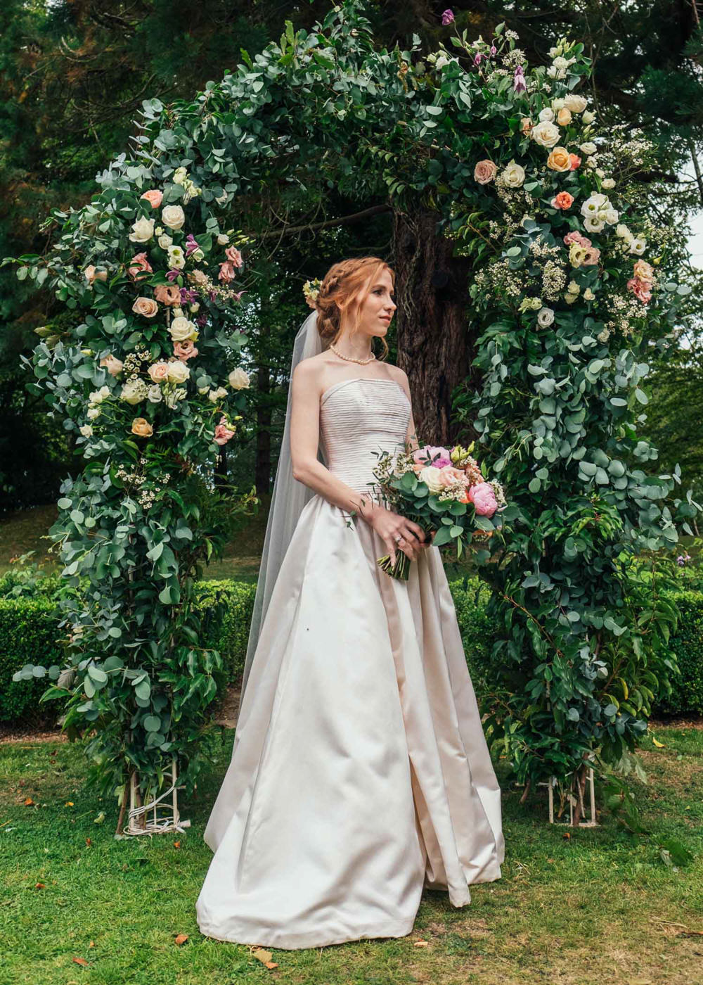 Bride Bridal Dress Gown Strapless Veil Flower Arch Backdrop Tinakilly Country House Wedding Conor Brennan Photography