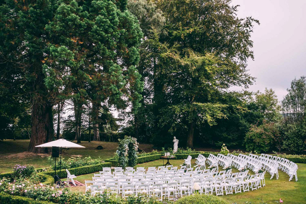 Outdoor Ceremony Garden Flower Arch Backdrop Aisle Tinakilly Country House Wedding Conor Brennan Photography
