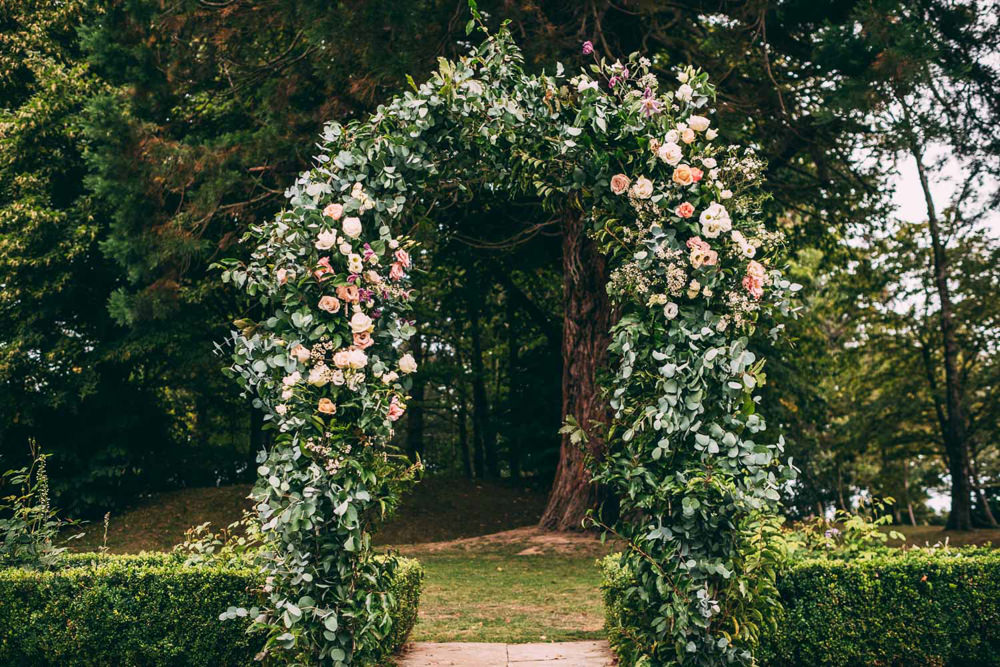 Outdoor Ceremony Garden Flower Arch Backdrop Aisle Tinakilly Country House Wedding Conor Brennan Photography
