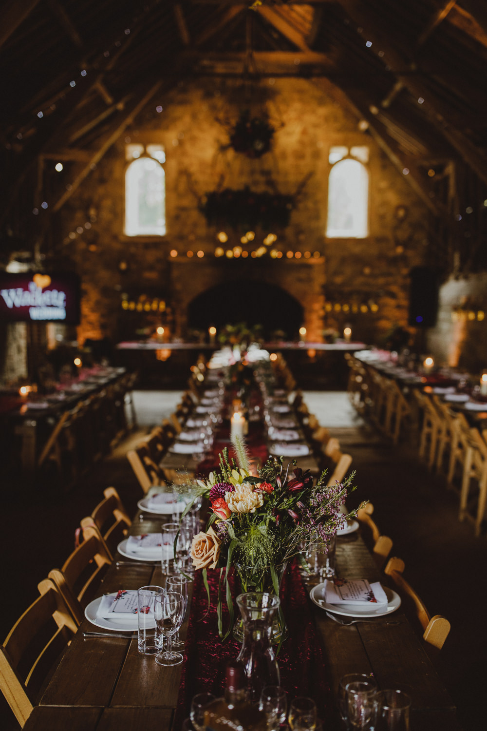 Long Tables Burgundy Table Runners Fairy Lights Flowers Wiltshire Barn Wedding Photography34