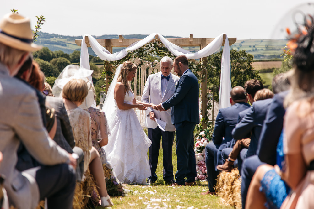Backdrop Arch Ceremony Aisle Fabric Flowers Wonwood Barton Wedding Emma Barrow Photography