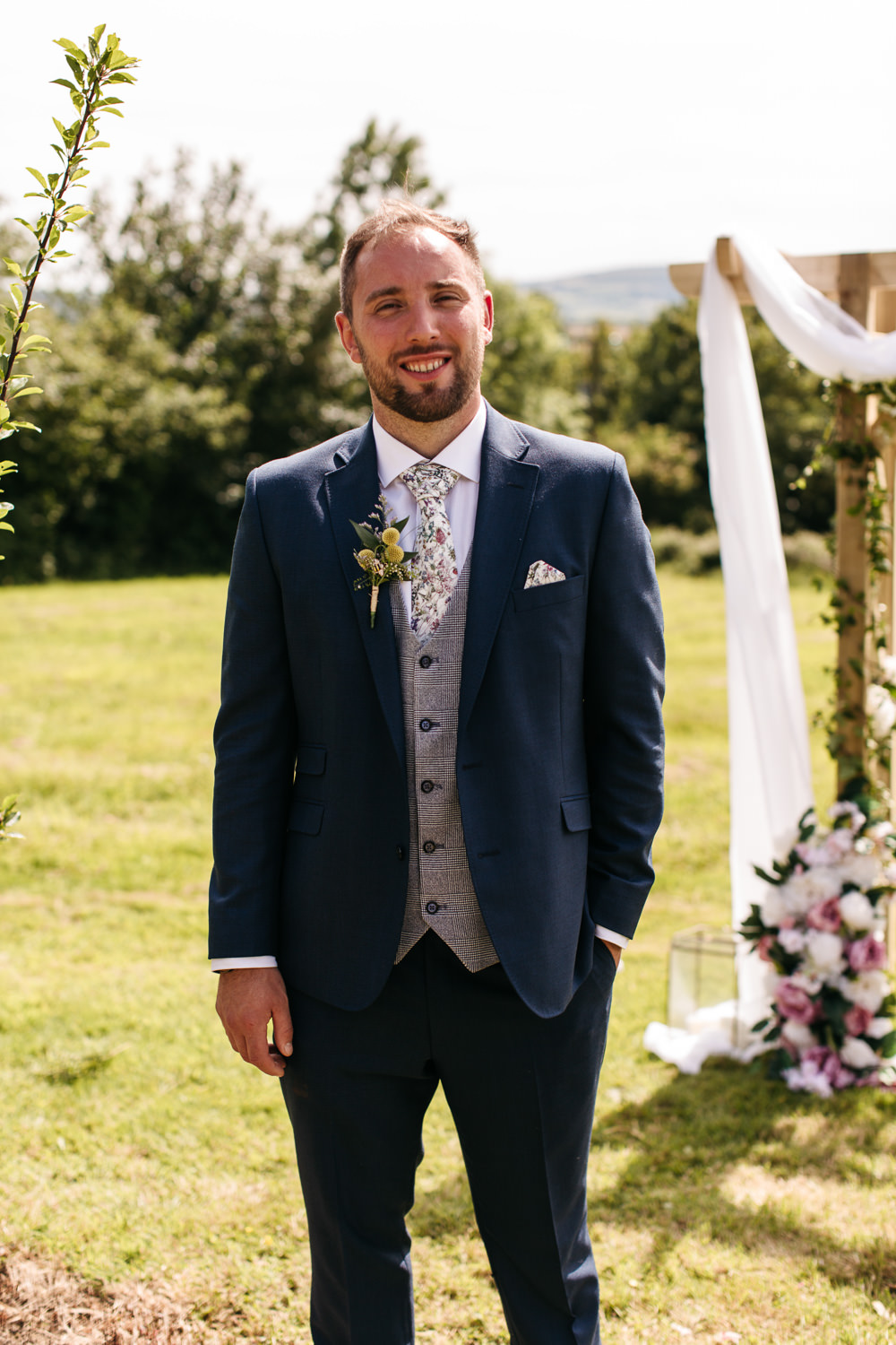 Groom Groomsmen Suit Navy Grey Waistcoat Floral Tie Wonwood Barton Wedding Emma Barrow Photography