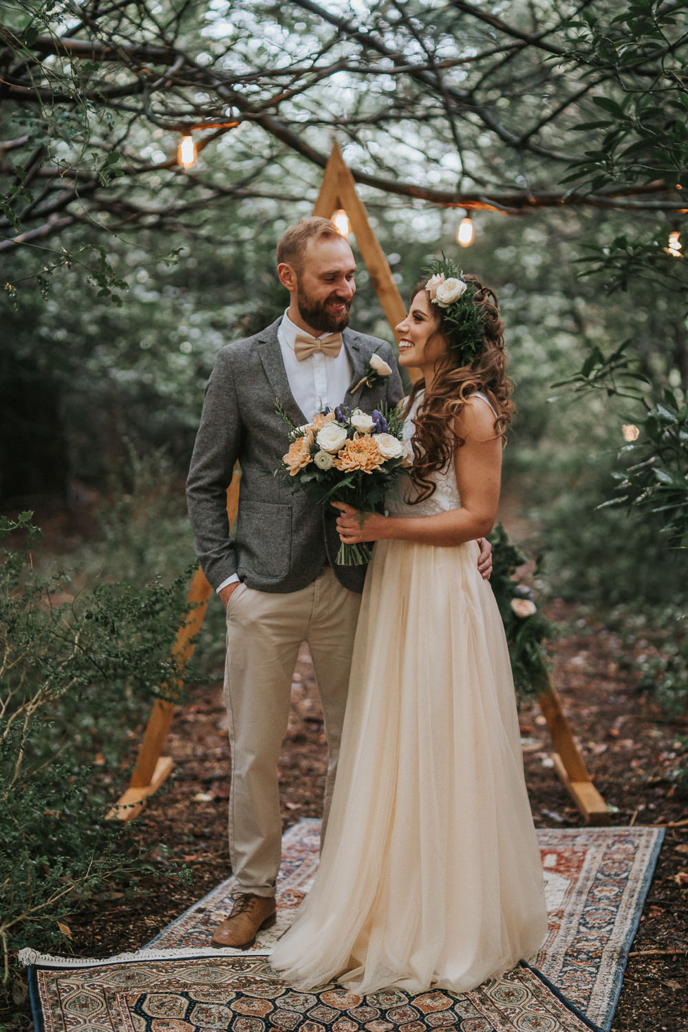 Woodland Wedding Inspiration Stephanie Dreams Photography Backdrop Triangle Wooden Festoon Lights Rugs Ceremony Aisle