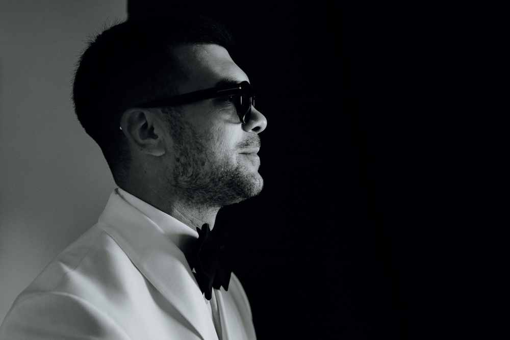Groom Suit Bow Tie White Jacket Aquapetra Resort Spa Wedding Peter Hughes Photography