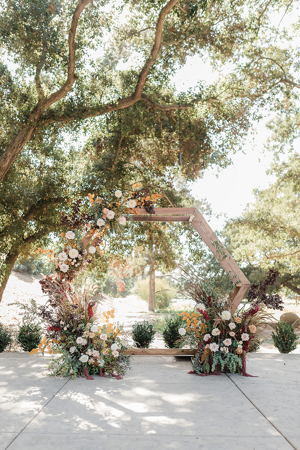 Flower Arch Backdrop Hexagon Flowers Ceremony Aisle California Ranch Wedding WildflowerPhotoCo
