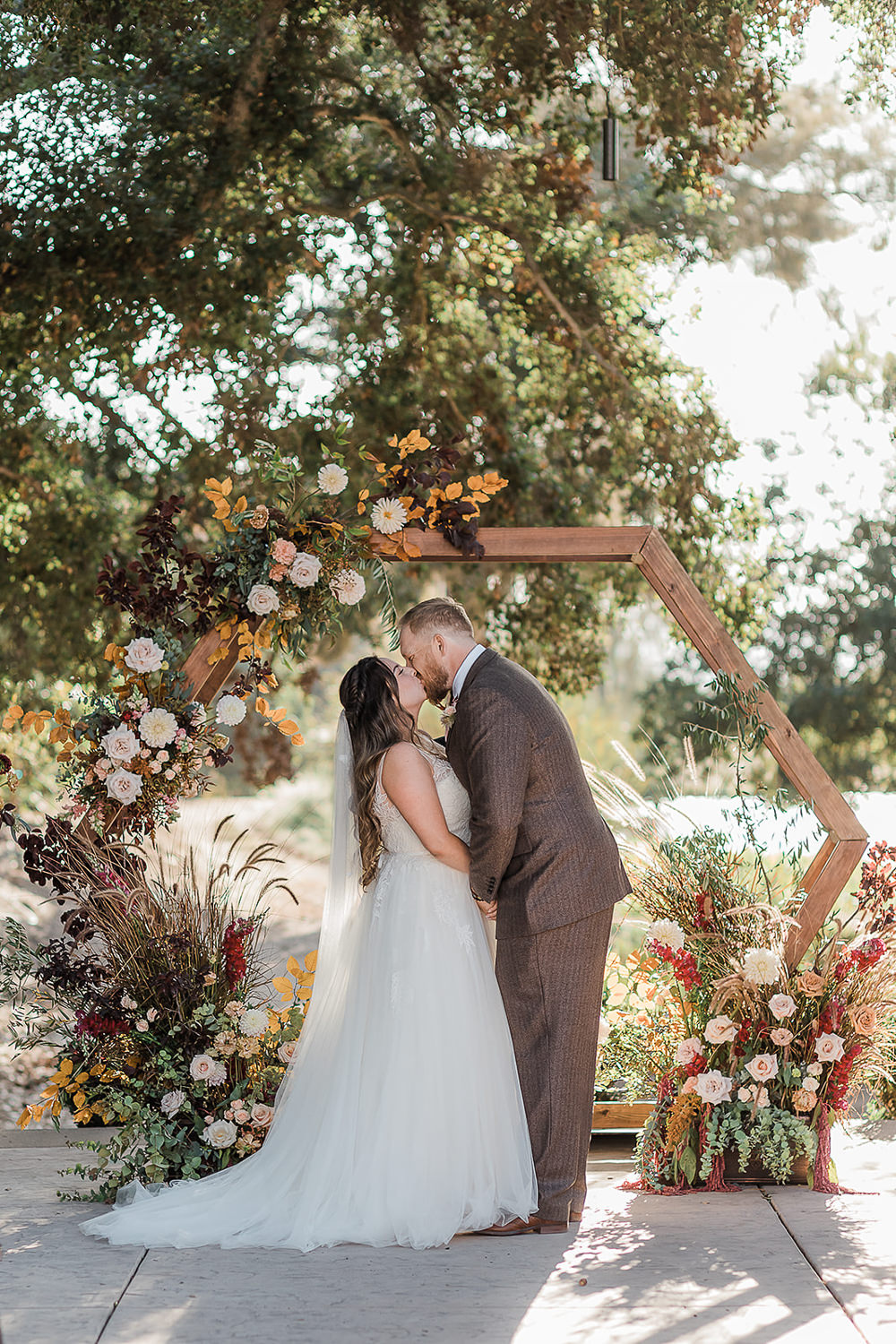 California Ranch Wedding WildflowerPhotoCo Flower Arch Backdrop Hexagon Flowers Ceremony Aisle