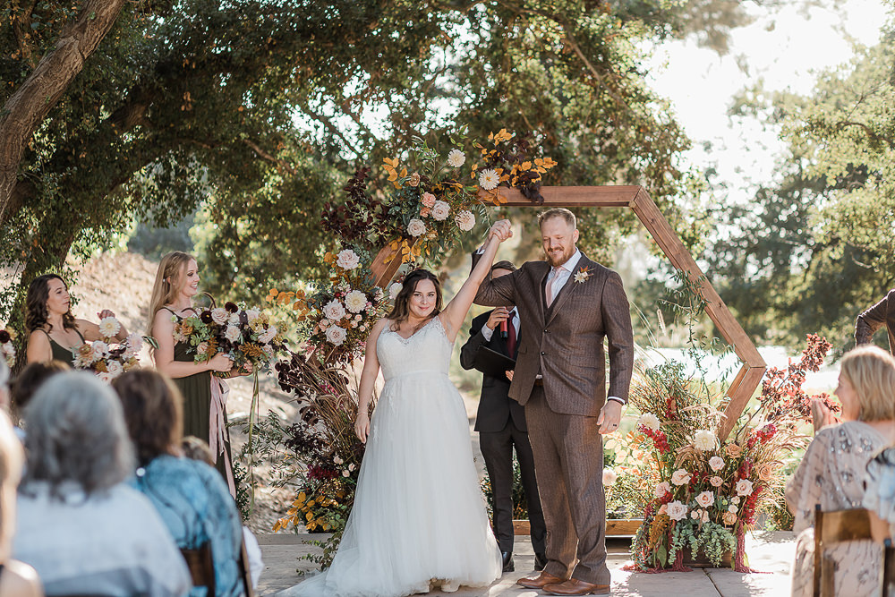 Flower Arch Backdrop Hexagon Flowers Ceremony Aisle California Ranch Wedding WildflowerPhotoCo