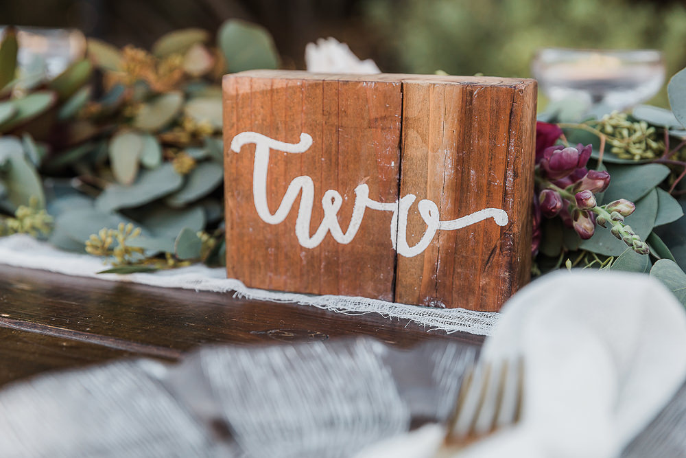 Wooden Table Number California Ranch Wedding WildflowerPhotoCo