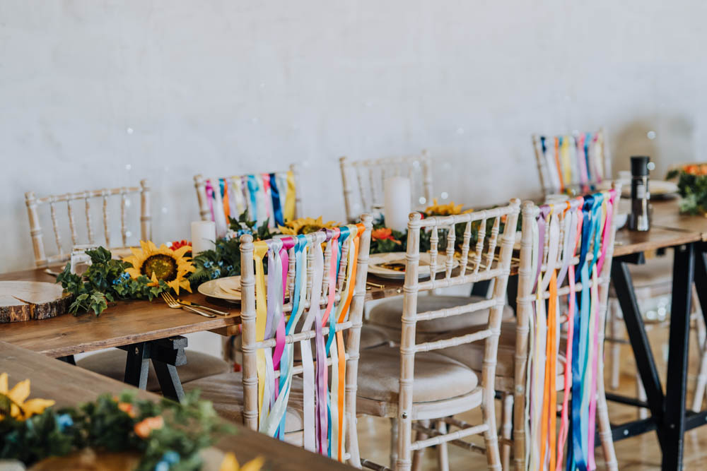 Rainbow Riboons Chairs Decor Chypraze Wedding Barn Clara Cooper Photography