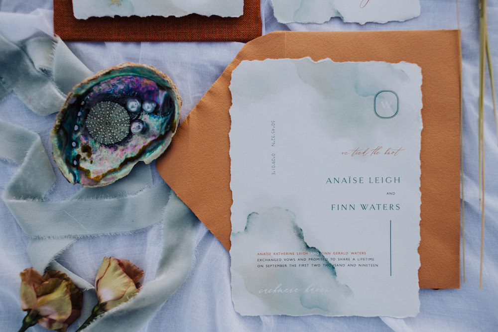 Stationery Suite Flat Lay Invite Invitation Rust Camel Callgraphy Coastal Elopement Manon Pauffin Photography