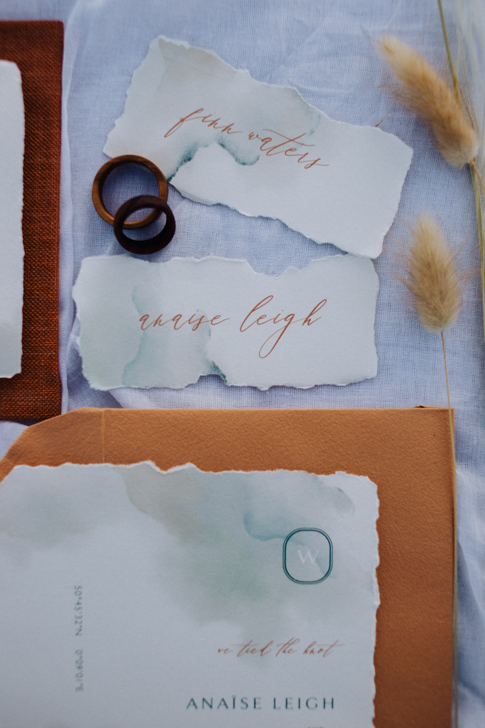 Stationery Suite Flat Lay Invite Invitation Rust Camel Callgraphy Coastal Elopement Manon Pauffin Photography