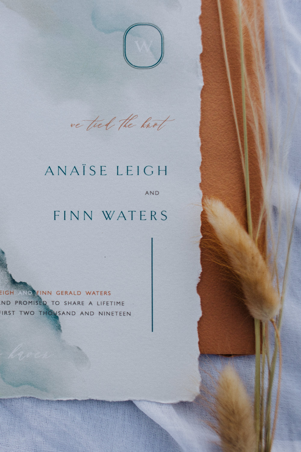 Stationery Suite Flat Lay Invite Invitation Rust Camel Callgraphy Coastal Elopement Manon Pauffin Photography