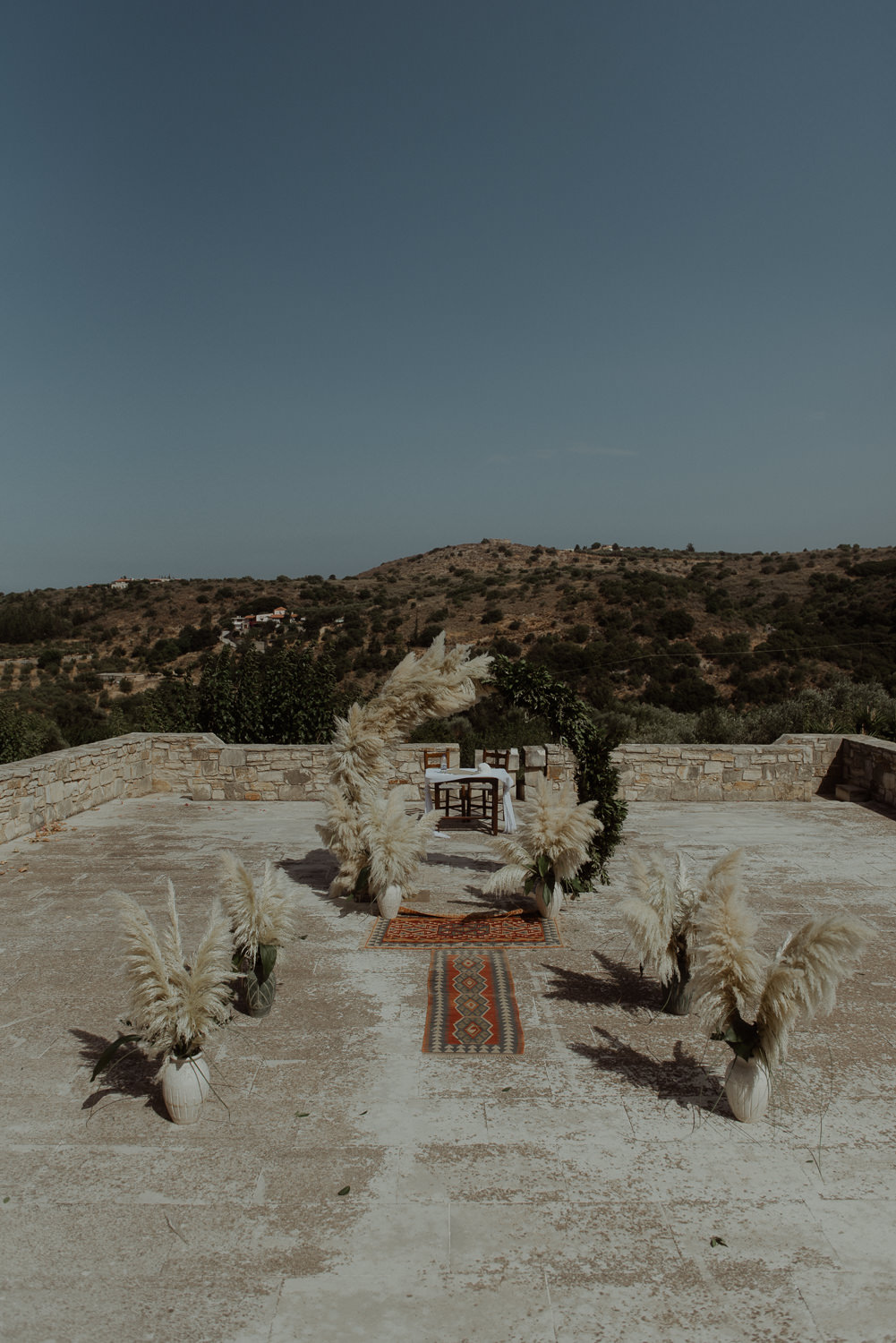 Aisle Ceremony Moon Gate Flower Arch Rugs Pampas Grass Backdrop Crete Destination Wedding Me and Georgia Photography