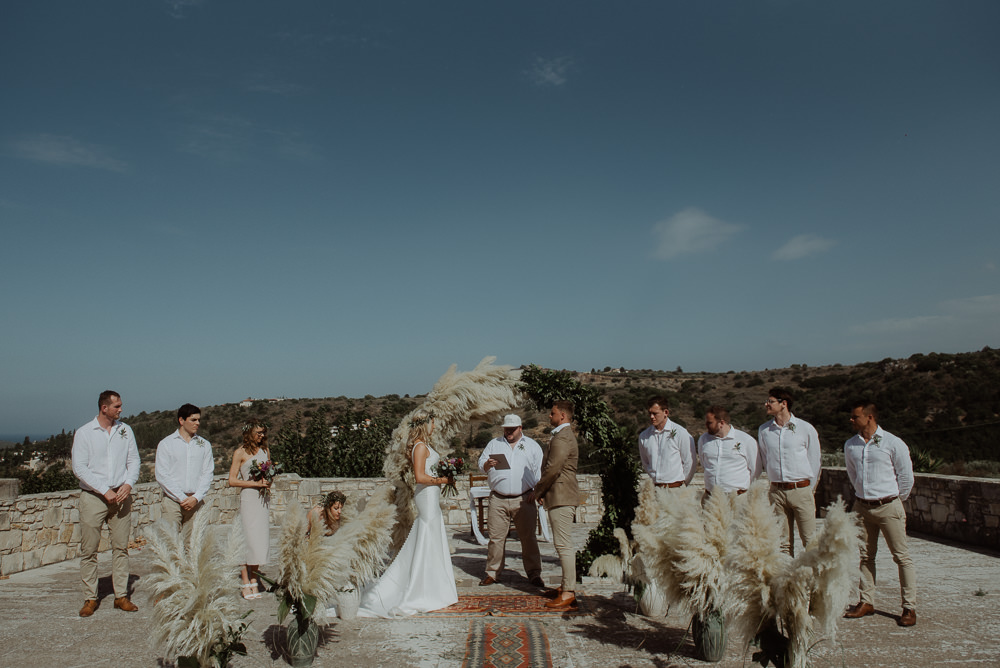 Aisle Ceremony Moon Gate Flower Arch Rugs Pampas Grass Backdrop Crete Destination Wedding Me and Georgia Photography