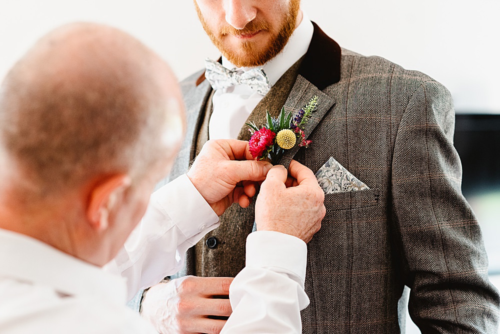 Groom Suit Grey Tweed Bow Tie Buttonhole Flowers DIY Tipi Wedding Fiona Kelly Photography
