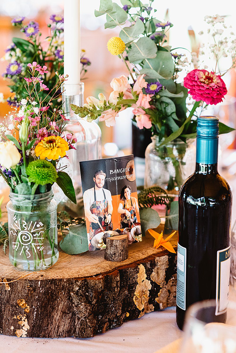 Centrepiece Log Slice Jar Flowers Colourful Wild DIY Tipi Wedding Fiona Kelly Photography