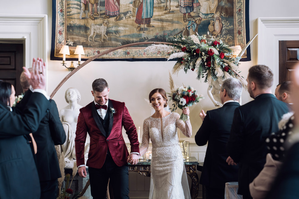 Moon Gate Flower Arch Backdrop Ceremony Decor Decadent Christmas Wedding Jessica Raphael Photography