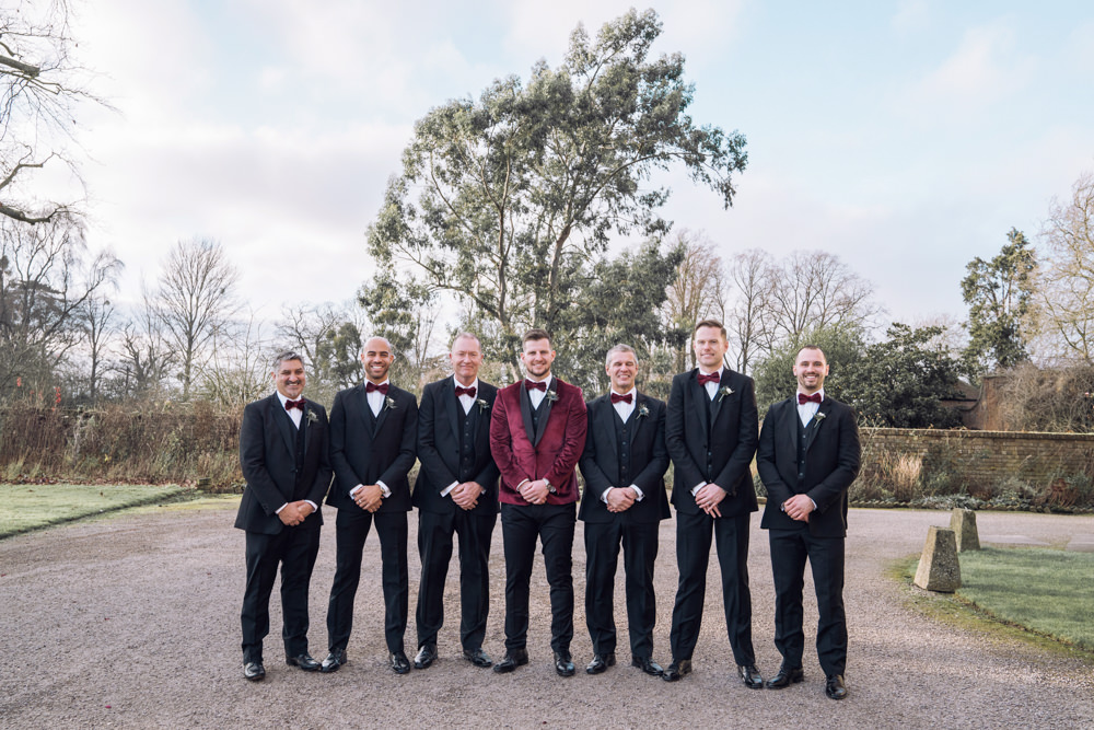 Groom Groomsmen Tuxedos Suits Bow Ties Decadent Christmas Wedding Jessica Raphael Photography