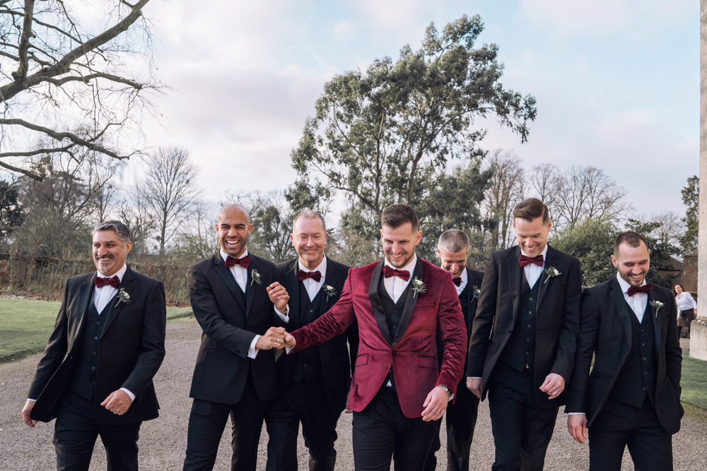 Groom Groomsmen Tuxedos Suits Bow Ties Decadent Christmas Wedding Jessica Raphael Photography