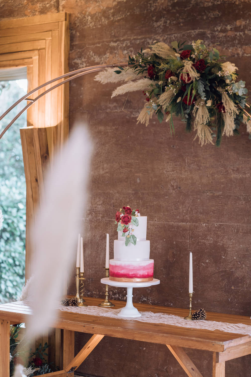 Moon Gate Flower Arch Cake Table Decadent Christmas Wedding Jessica Raphael Photography