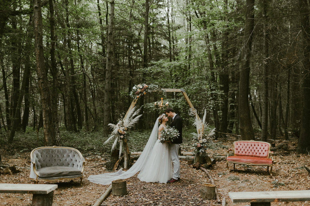 Outdoor Ceremony Aisle Hexagon Backdrop Pampas Grass Greenery Foliage Dreamy Woodland Wedding Ideas Jasmine Andrews Photography