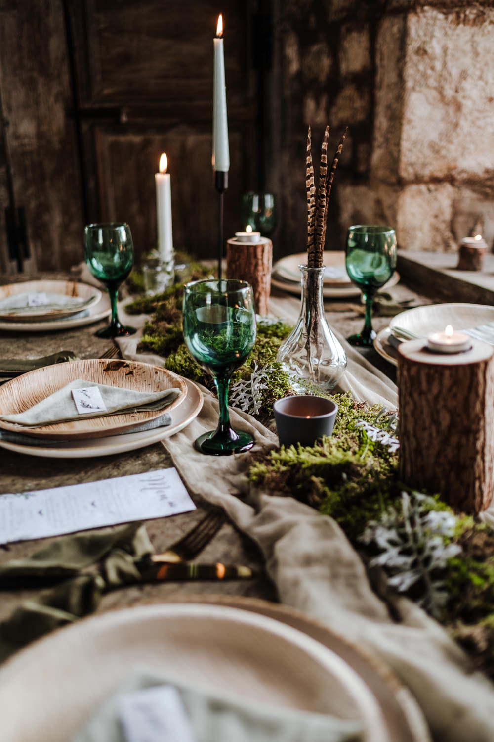 Table Tablescape Decor Wooden Candles Greenery Foliage Feathers Moss Ethical Wedding Ideas Jenna Kathleen Photographer