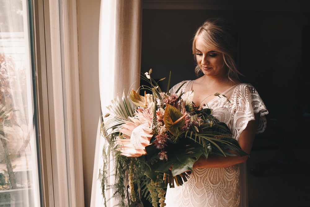 Bride Bridal Bouquet Flowers Tropical Protea Serruria Pineapples Succulents Glittery Wedding Winnington & Coe