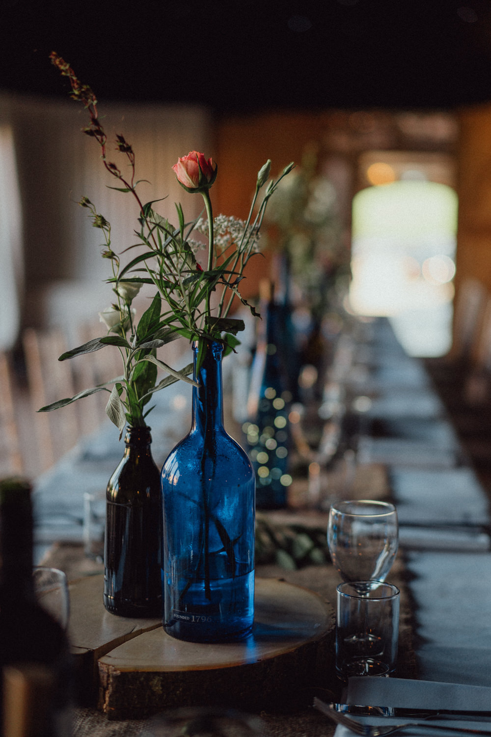 Long Tables Decor Bottle Flowers Hessian Log Slice Pitt Hall Barn Wedding Emily & Steve Photography