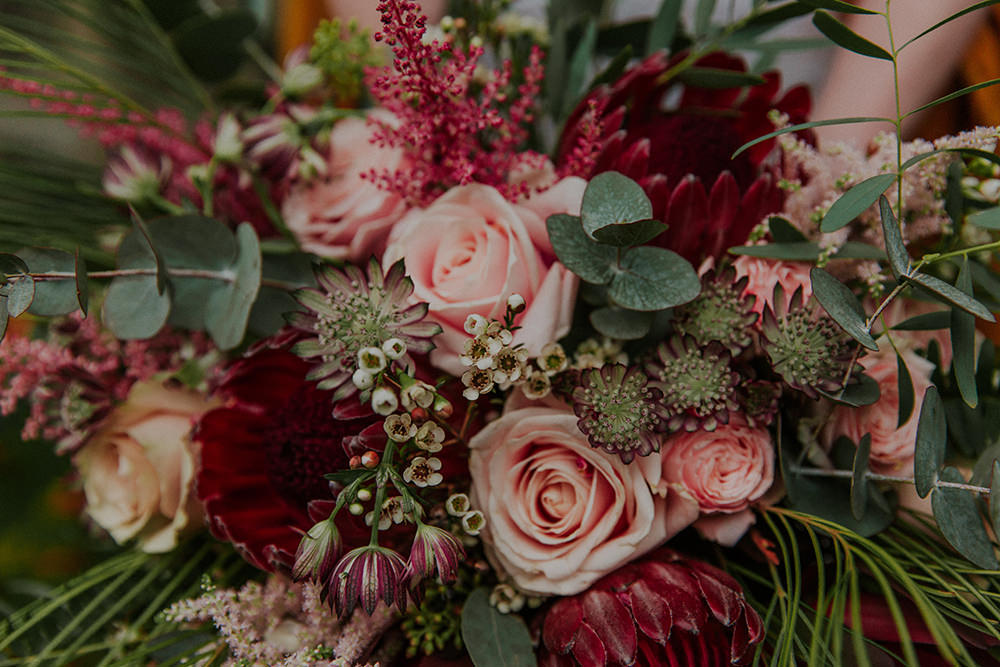 Bouquet Flowers Bride Bridal Burgundy Red Pink Rose Astilbe Protea Simple Autumn Wedding Maddie Farris Photography