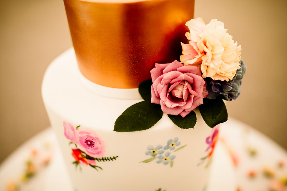 Copper Floral Cake Sperry Tent Wedding Hayley Baxter Photography